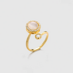Gold Alora oval pearl spinner ring in gold stainless steel for anxiety and stress relief.