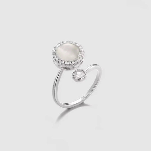 Alora oval pearl spinner ring in silver stainless steel for anxiety and stress relief.